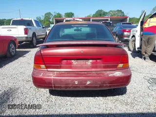 1998 Saturn SL z VIN 1G8ZK5270WZ223002, wystawiony jako IAAI lot #41959507 z przebiegiem Nie podano mil oraz . Historia ofert i sprzedaży dostępna na DreamBid. Obrazek 16.
