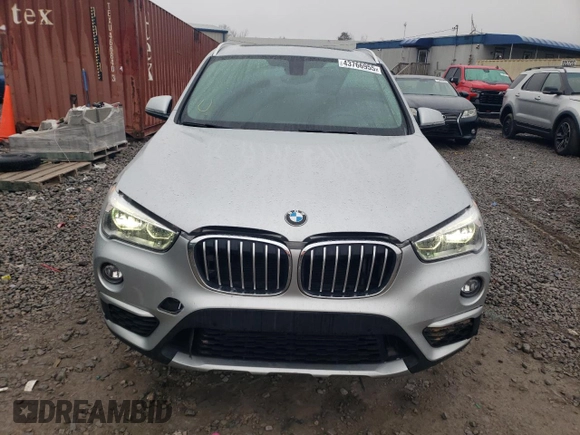 2018 BMW X1 xDrive28i with VIN WBXHT3C36J5F90135, listed as a Copart auction lot 43766955 with 76,530 mi miles and Salvage Title. Bid and sale history available at carsss.com. Image 5.