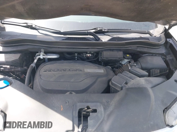 2018 Honda Pilot EX-L with VIN 5FNYF6H52JB066721, listed as a IAAI auction lot 42052842 with 134,393 mi miles and . Bid and sale history available at DreamBid. Image 10.