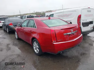 2009 Cadillac CTS AWD w/1SB with VIN 1G6DS57V490128140, listed as a IAAI auction lot 42001773 with 95,597 mi miles. Bid and sale history available at carsss.com. Image 3.