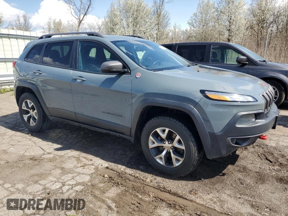 2014 Jeep Cherokee Trailhawk with VIN 1C4PJMBB4EW203320, listed as a Copart auction lot 53875305 with 112,425 mi miles and Clean Title. Bid and sale history available at carsss.com. Image 4.