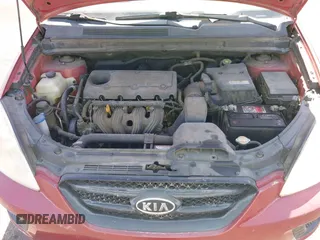 2008 Kia Rondo EX with VIN KNAFG525387174835, listed as a IAAI auction lot 42011406 with 138,656 mi miles. Bid and sale history available at carsss.com. Image 10.