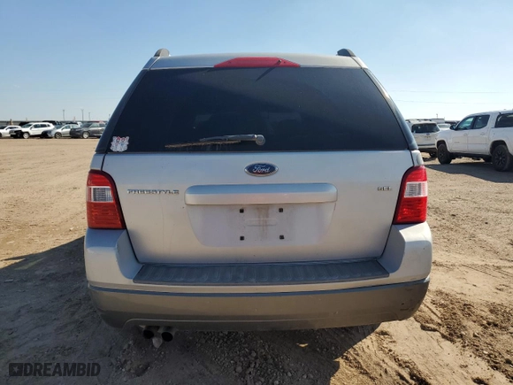 2005 Ford Freestyle SEL with VIN 1FMDK02135GA10159, listed as a Copart auction lot 72774784 with 146,096 mi miles and Salvage Title. Bid and sale history available at carsss.com. Image 6.