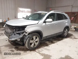 2012 Kia Sorento EX with VIN 5XYKU4A29CG285803, listed as a IAAI auction lot 41588493 with 171,891 mi miles. Bid and sale history available at carsss.com. Image 2.