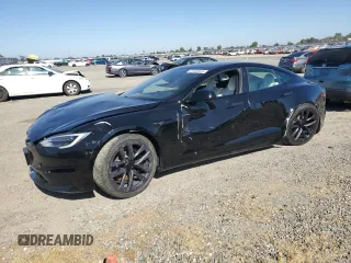 2022 Tesla Model S Plaid с VIN 5YJSA1E69NF460808, выставлен на аукционе Copart как лот 61646525 с пробегом Не указан миль и Списание • Salvage title. История ставок и продаж доступна на DreamBid. Изображение 1.