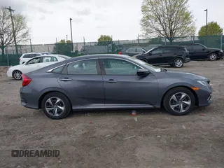 2019 Honda Civic Sedan LX with VIN 2HGFC2F66KH595946, listed as a IAAI auction lot 42017066 with 37,634 mi miles. Bid and sale history available at carsss.com. Image 13.