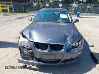 2007 BMW 3 Series 328i with VIN WBAVA33587PV65347, listed as a IAAI auction lot 42047770 with 1 mi miles. Bid and sale history available at carsss.com. Image 13.
