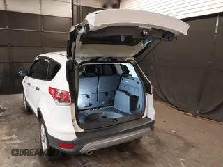 2014 Ford Escape S with VIN 1FMCU0F73EUB52663, listed as a IAAI auction lot 42092515 with 197,777 mi miles. Bid and sale history available at carsss.com. Image 3.