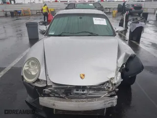 2006 Porsche 911 Carrera with VIN WP0AA29986S716141, listed as a IAAI auction lot 41198397 with 162,423 mi miles. Bid and sale history available at carsss.com. Image 13.