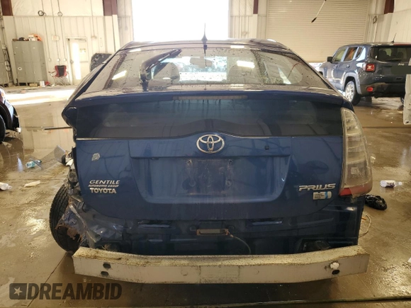 2008 Toyota Prius z VIN JTDKB20U687712274, wystawiony jako Copart lot #89291475 z przebiegiem 123 500 mil mil oraz Nie do naprawy • Non repairable. Historia ofert i sprzedaży dostępna na DreamBid. Obrazek 6.