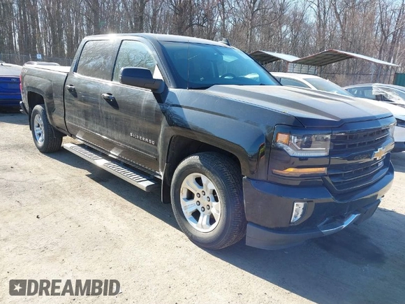 2018 Chevrolet Silverado 1500 LT with VIN 1GCUKREC3JF119906, listed as a IAAI auction lot 41765398 with 122,472 mi miles and . Bid and sale history available at DreamBid. Image 1.