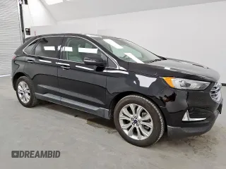 2021 Ford Edge Titanium с VIN 2FMPK4K94MBA27083, выставлен на аукционе Copart как лот 62149285 с пробегом 128 325 миль миль и Чистый • Clean title. История ставок и продаж доступна на DreamBid. Изображение 4.