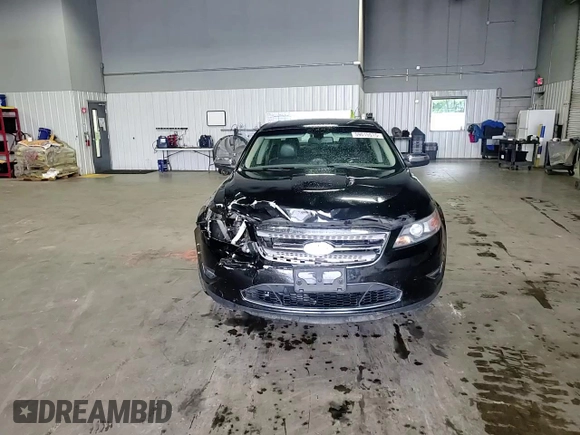 2012 Ford Taurus Limited с VIN 1FAHP2FW7CG100698, выставлен на аукционе Copart как лот 59015515 с пробегом 190 295 миль миль и Списание • Salvage title. История ставок и продаж доступна на DreamBid. Изображение 13.
