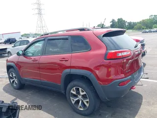2014 Jeep Cherokee Trailhawk with VIN 1C4PJMBS7EW162357, listed as a IAAI auction lot 42601903 with 104,768 mi miles and . Bid and sale history available at DreamBid. Image 14.