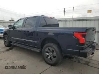 2023 Ford F-150 Lightning Pro with VIN 1FT6W1EV8PWG38071, listed as a Copart auction lot 51091495 with 13,687 mi miles and Salvage title. Bid and sale history available at DreamBid. Image 2.