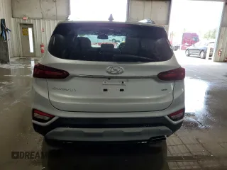 2019 Hyundai Santa Fe Ultimate z VIN 5NMS5CAD4KH002169, wystawiony jako Copart lot #58560645 z przebiegiem 27 762 mil mil oraz Szkoda całkowita • Salvage title. Historia ofert i sprzedaży dostępna na DreamBid. Obrazek 6.