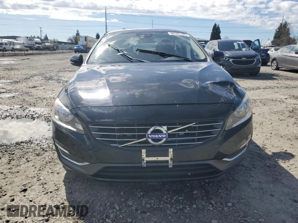 2014 Volvo S60 T5 z VIN YV1612FS0E2295344, wystawiony jako Copart lot #50101125 z przebiegiem 75 959 mil mil oraz Szkody całkowita. Historia ofert i sprzedaży dostępna na DreamBid. Obrazek 5.