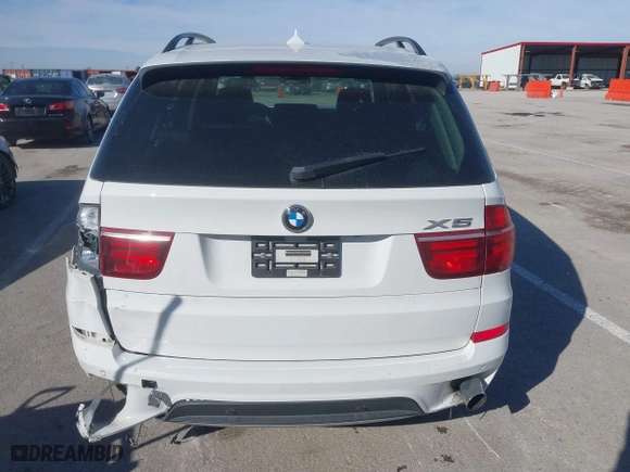 2011 BMW X5 35i with VIN 5UXZV4C57BL406526, listed as a IAAI auction lot 41580453 with 0 mi miles. Bid and sale history available at carsss.com. Image 6.