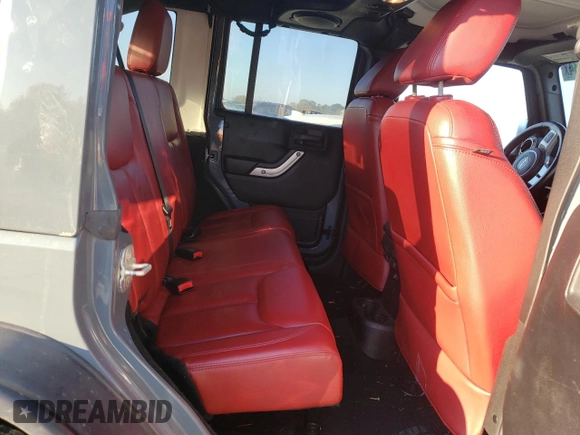 2013 Jeep Wrangler Unlimited Rubicon 10th Anniversary z VIN 1C4HJWFG0DL704100, wystawiony jako Copart lot #75573634 z przebiegiem 103 158 mil mil oraz Szkoda całkowita • Salvage title. Historia ofert i sprzedaży dostępna na DreamBid. Obrazek 11.