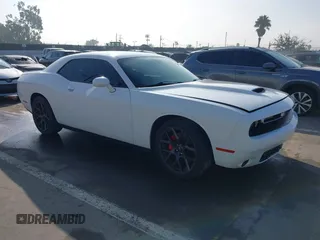 2019 Dodge Challenger GT z VIN 2C3CDZJG7KH503920, wystawiony jako IAAI lot #41604967 z przebiegiem 93 829 mil mil oraz . Historia ofert i sprzedaży dostępna na DreamBid. Obrazek 1.
