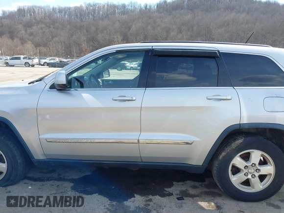 2013 Jeep Grand Cherokee Laredo with VIN 1C4RJFAG5DC634685, listed as a IAAI auction lot 41792147 with 260,594 mi miles. Bid and sale history available at carsss.com. Image 14.