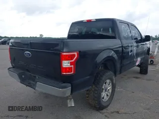 2020 Ford F-150 XL with VIN 1FTEW1C51LKD27579, listed as a IAAI auction lot 42527114 with 128,151 mi miles and . Bid and sale history available at DreamBid. Image 4.