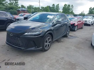 2023 Lexus RX 350 z VIN 2T2BAMCA9PC034273, wystawiony jako IAAI lot #42653429 z przebiegiem 29 826 mil mil oraz . Historia ofert i sprzedaży dostępna na DreamBid. Obrazek 2.