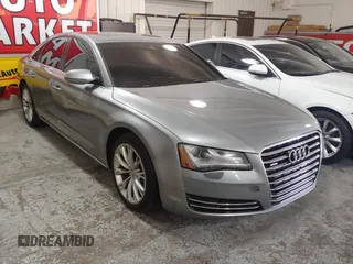 2012 Audi A8 z VIN WAUAVAFD2CN028862, wystawiony jako Copart lot #60073795 z przebiegiem 162 768 mil mil oraz Czysty tytuł • Clean title. Historia ofert i sprzedaży dostępna na DreamBid. Obrazek 1.