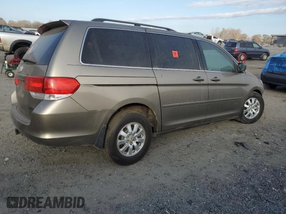 2009 Honda Odyssey EX-L with VIN 5FNRL38649B413532, listed as a Copart auction lot 79867014 with 308,701 mi miles and Salvage Title. Bid and sale history available at DreamBid. Image 3.