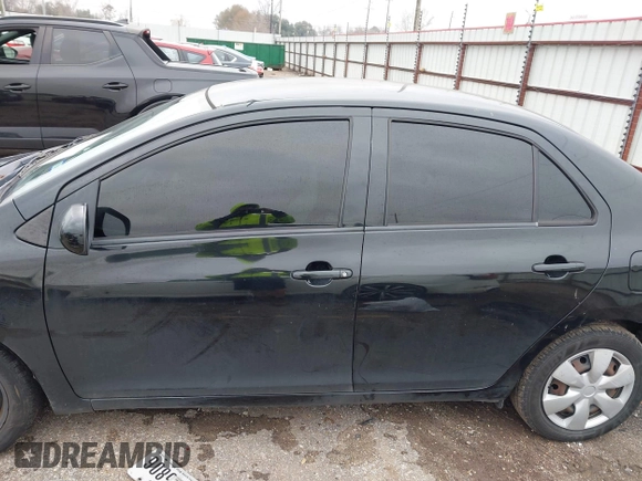2012 Toyota Yaris with VIN JTDBT4K31CL025197, listed as a IAAI auction lot 41424640 with 165,731 mi miles. Bid and sale history available at carsss.com. Image 14.