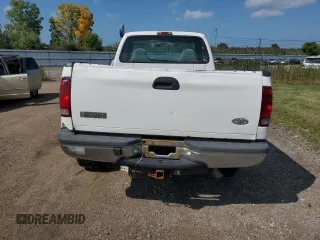 1999 Ford Super Duty F-250 XL with VIN 1FTNF21F8XED38956, listed as a Copart auction lot 69384214 with 143,127 mi miles and Salvage Title. Bid and sale history available at carsss.com. Image 6.