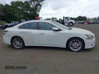 2014 Nissan Maxima S with VIN 1N4AA5AP1EC478918, listed as a IAAI auction lot 40426108 with 101,635 mi miles and . Bid and sale history available at DreamBid. Image 13.
