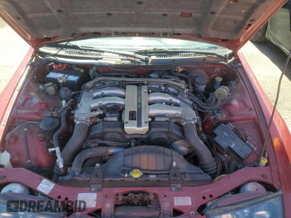 1994 Nissan 300ZX z VIN JN1RZ27D5RX010824, wystawiony jako Copart lot #71235024 z przebiegiem 93 564 mil mil oraz Szkoda całkowita • Salvage title. Historia ofert i sprzedaży dostępna na DreamBid. Obrazek 11.