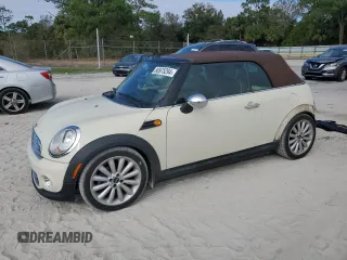 2012 MINI Convertible with VIN WMWZN3C51CT134016, listed as a Copart auction lot 80975294 with 86,823 mi miles and Salvage Title. Bid and sale history available at DreamBid. Image 1.