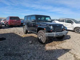 2013 Jeep Wrangler Unlimited Rubicon 10th Anniversary z VIN 1C4HJWFG6DL557085, wystawiony jako Copart lot #41693075 z przebiegiem 139 240 mil mil oraz Szkoda całkowita • Salvage title. Historia ofert i sprzedaży dostępna na DreamBid. Obrazek 4.