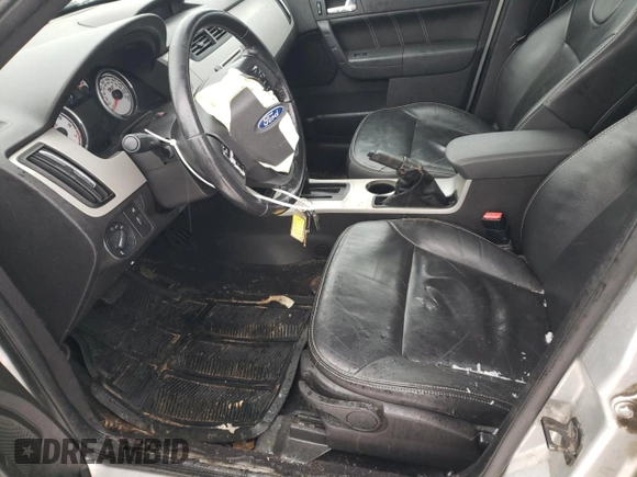 2009 Ford Focus SES with VIN 1FAHP36N19W214689, listed as a Copart auction lot 43001385 with 295,859 mi miles and Salvage Title. Bid and sale history available at carsss.com. Image 7.