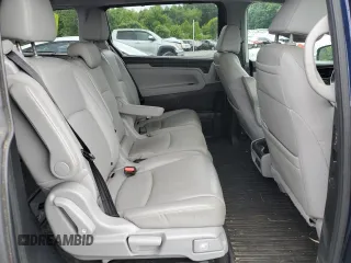 2018 Honda Odyssey Elite z VIN 5FNRL6H9XJB039802, wystawiony jako Copart lot #57116345 z przebiegiem 107 939 mil mil oraz Szkody całkowita. Historia ofert i sprzedaży dostępna na DreamBid. Obrazek 11.