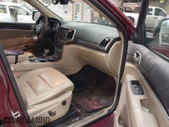 2018 Jeep Grand Cherokee Limited with VIN 1C4RJFBGXJC103685, listed as a IAAI auction lot 41758872 with 61,514 mi miles and . Bid and sale history available at DreamBid. Image 5.