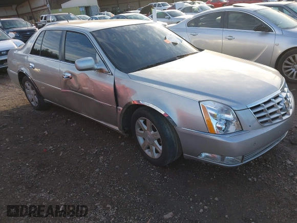 2006 Cadillac DTS 1SC z VIN 1G6KD57Y26U104838, wystawiony jako IAAI lot #41280412 z przebiegiem 172 494 mil mil oraz . Historia ofert i sprzedaży dostępna na DreamBid. Obrazek 1.