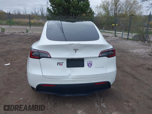 2022 Tesla Model Y Long Range with VIN 7SAYGDEE1NF421098, listed as a IAAI auction lot 42177555 with 55,855 mi miles and . Bid and sale history available at carsss.com. Image 17.
