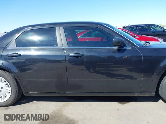 2007 Chrysler 300 with VIN 2C3KA43R47H888706, listed as a IAAI auction lot 41849210 with 135,156 mi miles. Bid and sale history available at carsss.com. Image 14.