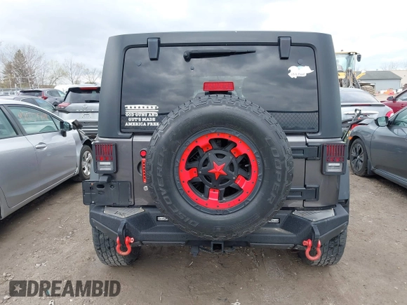 2014 Jeep Wrangler Unlimited Sport with VIN 1C4BJWDG6EL239378, listed as a IAAI auction lot 42073392 with 120,999 mi miles. Bid and sale history available at carsss.com. Image 17.