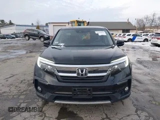 2020 Honda Pilot EX-L z VIN 5FNYF6H50LB022798, wystawiony jako IAAI lot #41592012 z przebiegiem 67 045 mil mil oraz . Historia ofert i sprzedaży dostępna na DreamBid. Obrazek 12.
