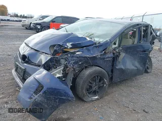 2013 Toyota Prius One with VIN JTDKN3DU2D1687801, listed as a IAAI auction lot 40650178 with 58,017 mi miles and . Bid and sale history available at DreamBid. Image 2.