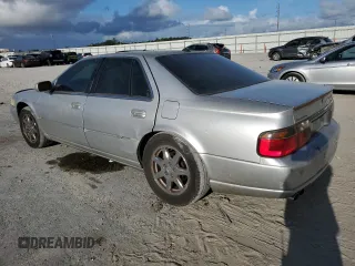 2003 Cadillac Seville Touring STS z VIN 1G6KY54923U101998, wystawiony jako Copart lot #74029304 z przebiegiem 134 157 mil mil oraz Szkoda całkowita • Salvage title. Historia ofert i sprzedaży dostępna na DreamBid. Obrazek 2.