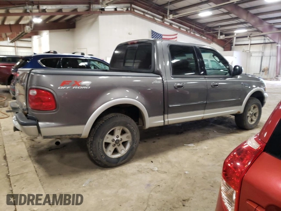 2002 Ford F-150 XLT with VIN 1FTRW08L92KD19411, listed as a Copart auction lot 50986795 with 164,556 mi miles and Clean Title. Bid and sale history available at carsss.com. Image 3.
