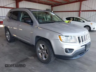 2011 Jeep Compass Limited with VIN 1J4NF5FB1BD169573, listed as a IAAI auction lot 42142681 with 236,590 mi miles. Bid and sale history available at carsss.com. Image 1.