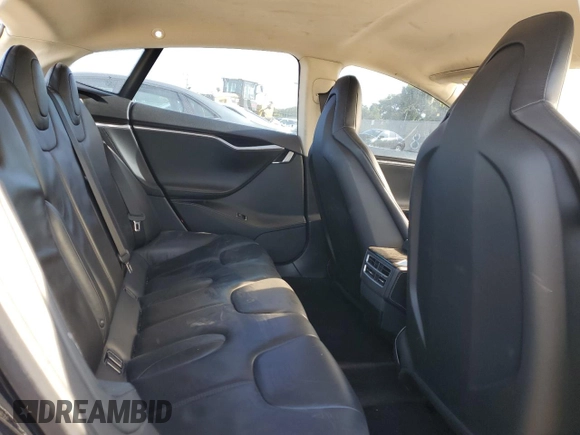 2014 Tesla Model S 60 with VIN 5YJSA1H13EFP38425, listed as a Copart auction lot 63686205 with 183,968 mi miles and Salvage title. Bid and sale history available at DreamBid. Image 10.