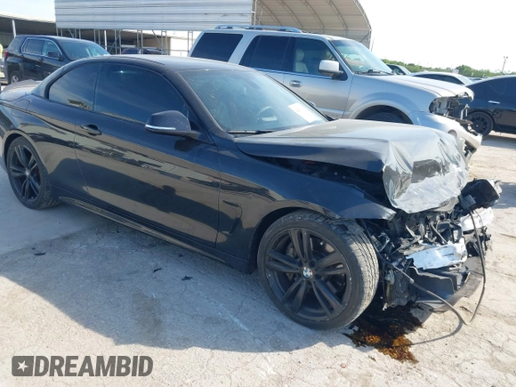 2014 BMW 4 Series 435i with VIN WBA3T3C59EP737612, listed as a IAAI auction lot 42260394 with 104,877 mi miles and . Bid and sale history available at DreamBid. Image 1.