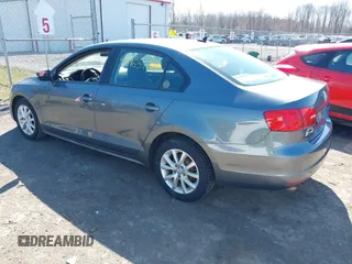 2011 Volkswagen Jetta SE with VIN 3VWBZ7AJ1BM027204, listed as a IAAI auction lot 41816349 with 152,028 mi miles and . Bid and sale history available at DreamBid. Image 3.